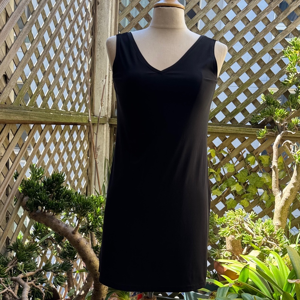 SYMPLI  TUNIC . Black. Size 4. ( Sm-Med). Side Slits 10” long.
NWOT
